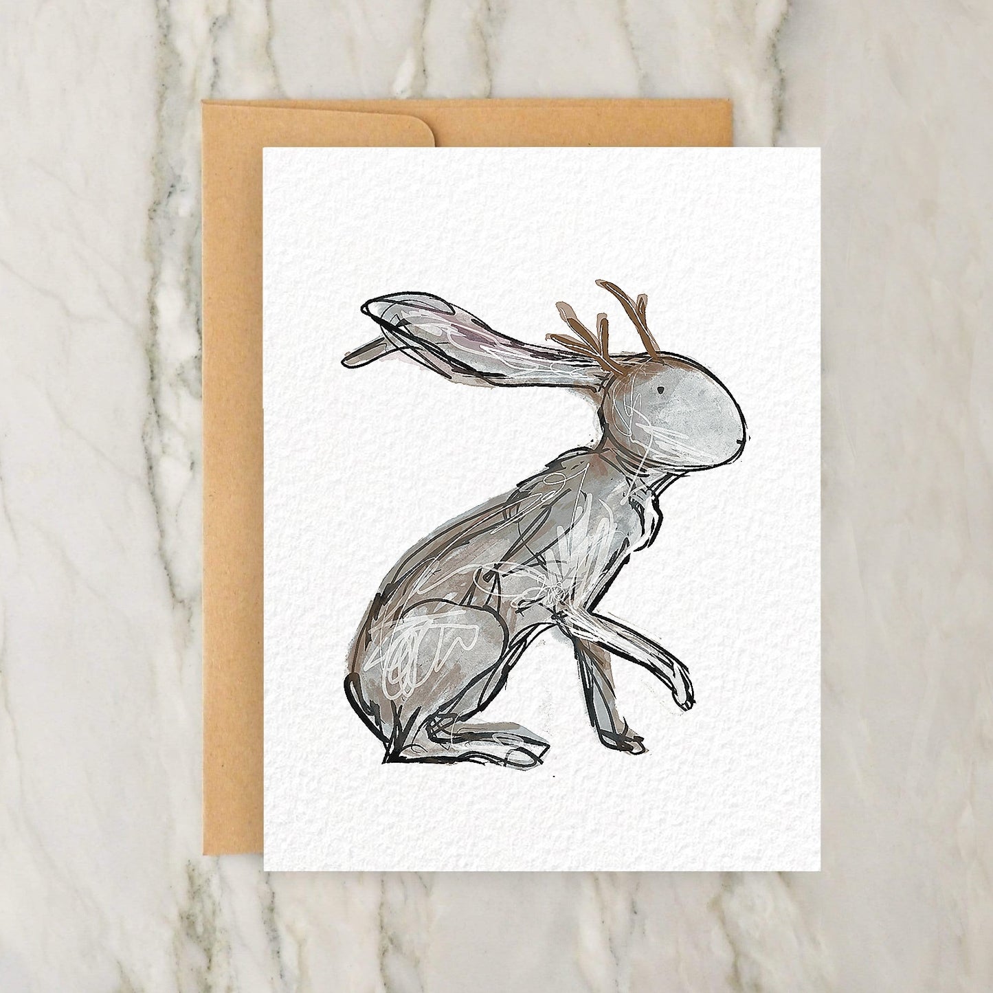 a card with a drawing of a rabbit on it