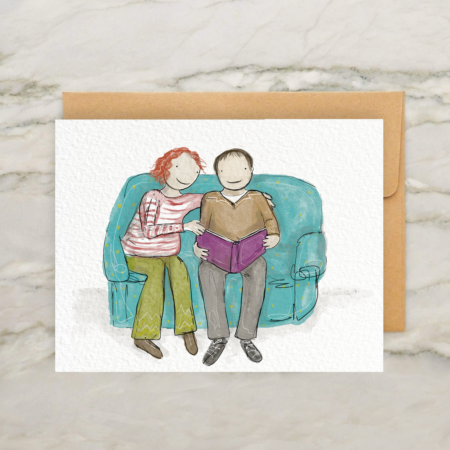 a card with a drawing of two people sitting on a couch