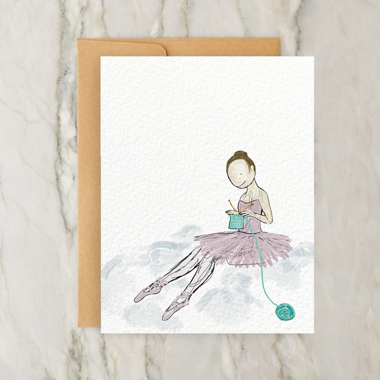 a card with a drawing of a ballerina on it